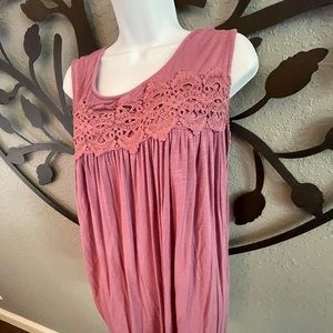 Suzanne Betro plus size woman’s sleeveless top.
